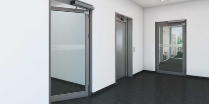 Automatischer Drehtürantrieb von GU Automatic für barrierefreie, moderne und sichere Eingänge in Bürogebäuden, öffentlichen Einrichtungen und Hotels.